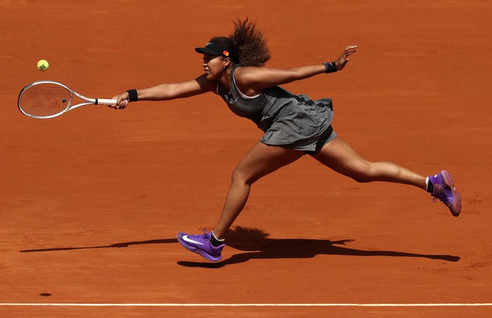 <p>Naomi Osaka gives it her all on Friday during her first round match at the Mutua Madrid Open in Spain.</p>