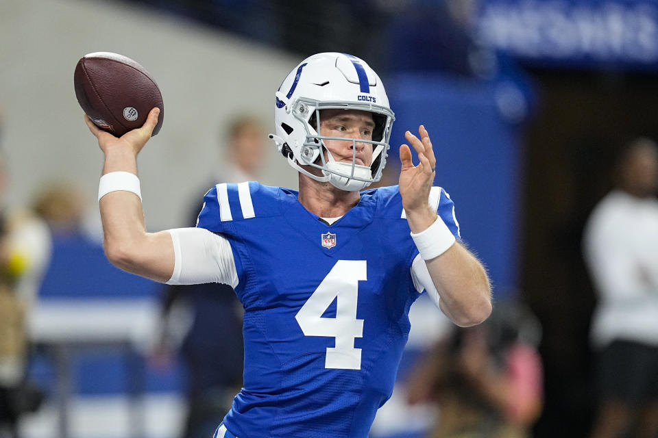 Indianapolis Colts quarterback Sam Ehlinger (4) throws before an NFL football game against the Washington Commanders in Indianapolis, Sunday, Oct. 30, 2022. (AP Photo/Darron Cummings)