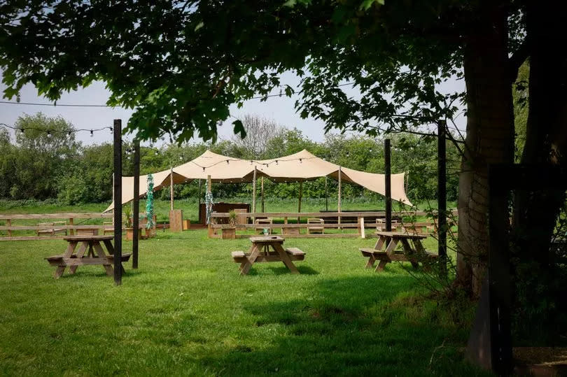 The stretch canopy at Ye Olde Bridge Inn's beer garden