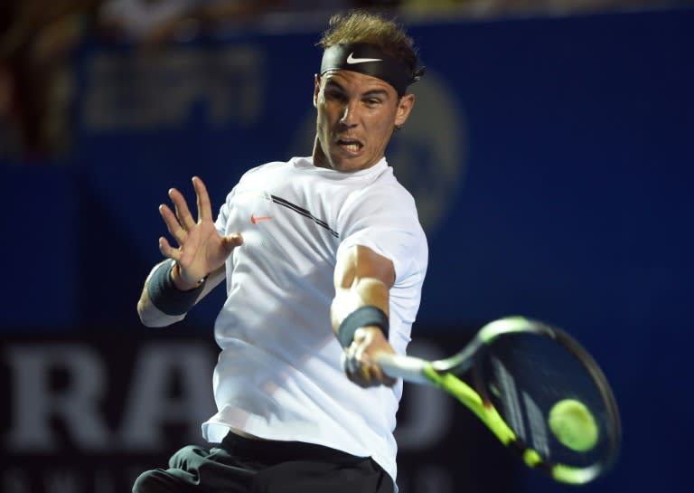 Spain's Rafael Nadal returns the ball to Italy's Paolo Lorenzi during their ATP Acapulco tournament match, in Mexico, on March 1, 2017