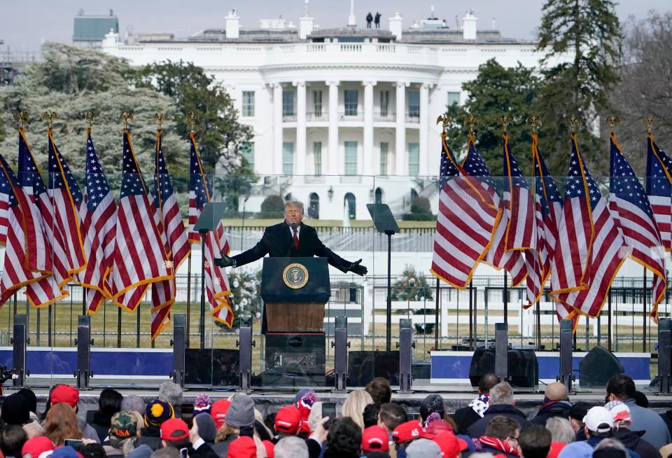 In this Jan. 6, 2021, file photo with the White House in the background, President Donald Trump speaks at a rally in Washington. Soon after he spoke, thousands of supporters marched on the Capitol, some of whom stormed the building.