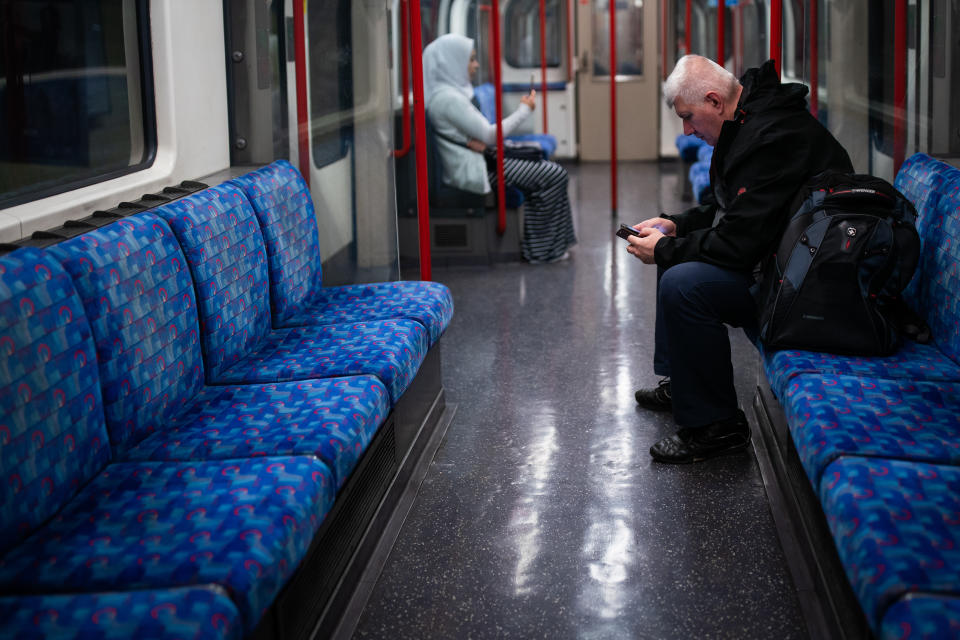 Members of the public stay socially distant on the Central Line as the UK continues in lockdown to help curb the spread of the coronavirus.