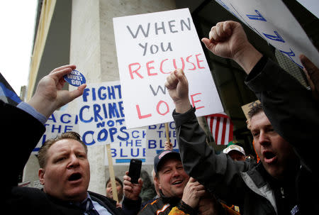 Fraternal Order of Police supporters protest the handling of the Jussie Smollett case by the State's Attorney Kim Foxx in Chicago, Illinois, U.S., April 1, 2019. REUTERS/Joshua Lott