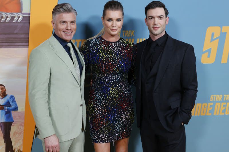 From left to right, Anson Mount, Rebecca Romijn and Ethan Peck arrive on the red carpet at the New York premiere of "Star Trek: Strange New Worlds" in 2022. File Photo by John Angelillo/UPI