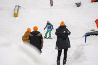 Bronwyn Rassmann competes in the Winter Whip Slopestyle snowboard and ski competition at the Afriski ski resort near Butha-Buthe, Lesotho, Saturday July 30, 2022. Rassmann finished second in the women's category. While millions across Europe sweat through a summer of record-breaking heat, Afriski in the Maluti Mountains is Africa's only operating ski resort south of the equator. It draws people from neighboring South Africa and further afield by offering a unique experience to go skiing in southern Africa. (AP Photo/Jerome Delay)