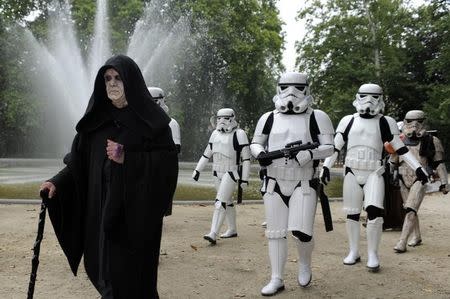 Participants wearing Star Wars costumes are seen at the Royal Parc after the Balloon's Day Parade in Brussels September 6, 2014. REUTERS/Eric Vidal