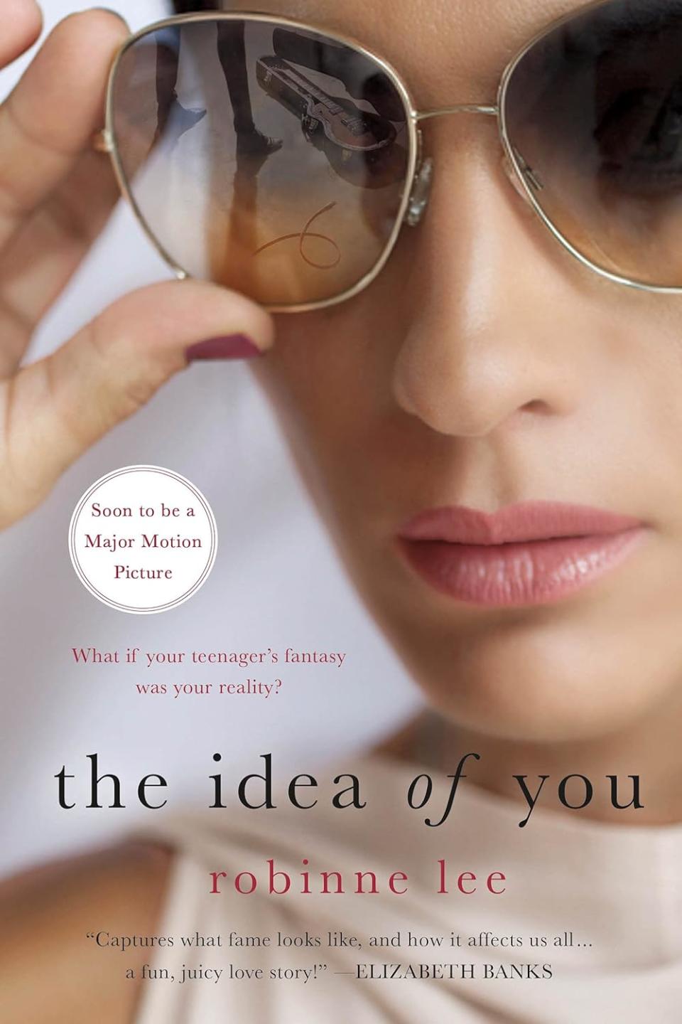 book cover of the idea of you featuring model in sunglasses