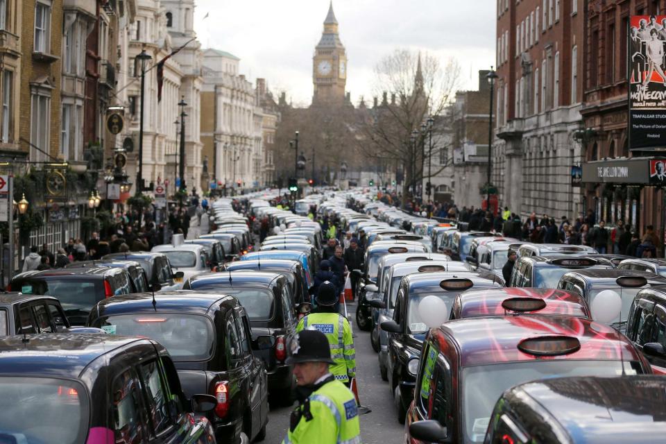 FLondon taxis block the roads during a protest in central London, concerned with unfair competition from services such as Uber (February 2016): AP
