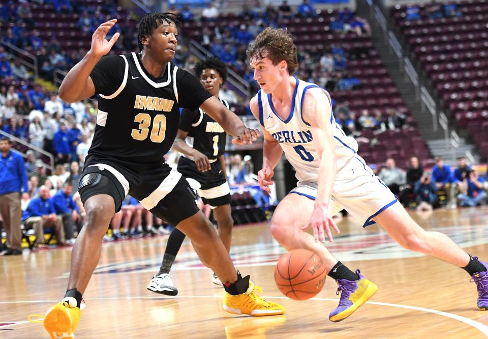 Berlin Brothersvalley’s Ryan Blubaugh drives against Imani Christian’s Virgil Hall (30) during the PIAA Class 1A boys basketball championship, March 23, at the Giant Center in Hershey.