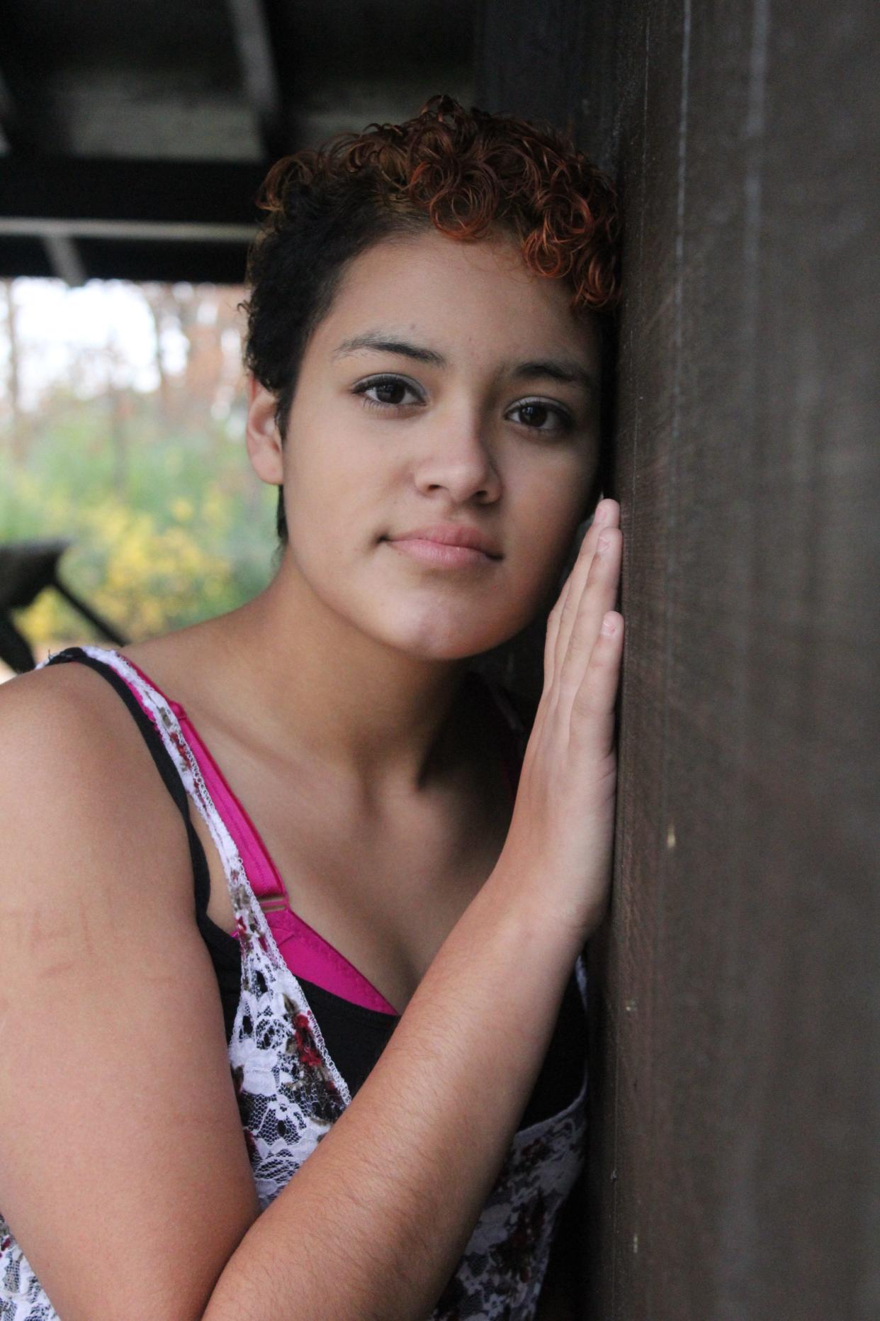 Maricella Chairez pictured at age 14 in July 2015. After weeks at a residential treatment center, she was back home, with a new haircut by her mother and grandmother.