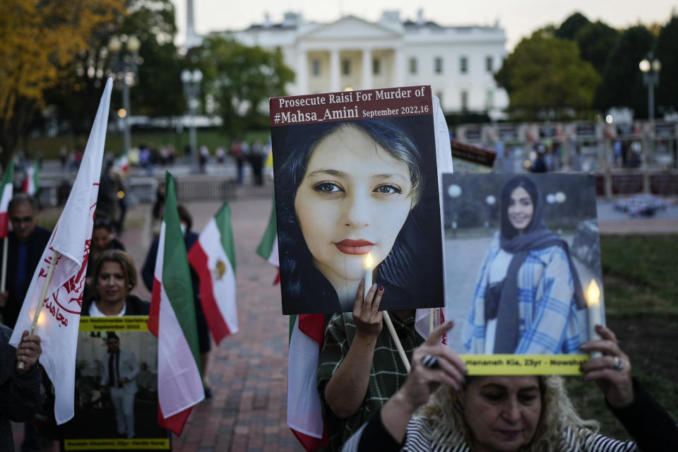 Demonstrators hold a vigil in support of protests in Iran over the death of Mahsa Amini in Lafayette Square near the White House on Oct. 26, 2022.  (Drew Angerer / Getty Images)