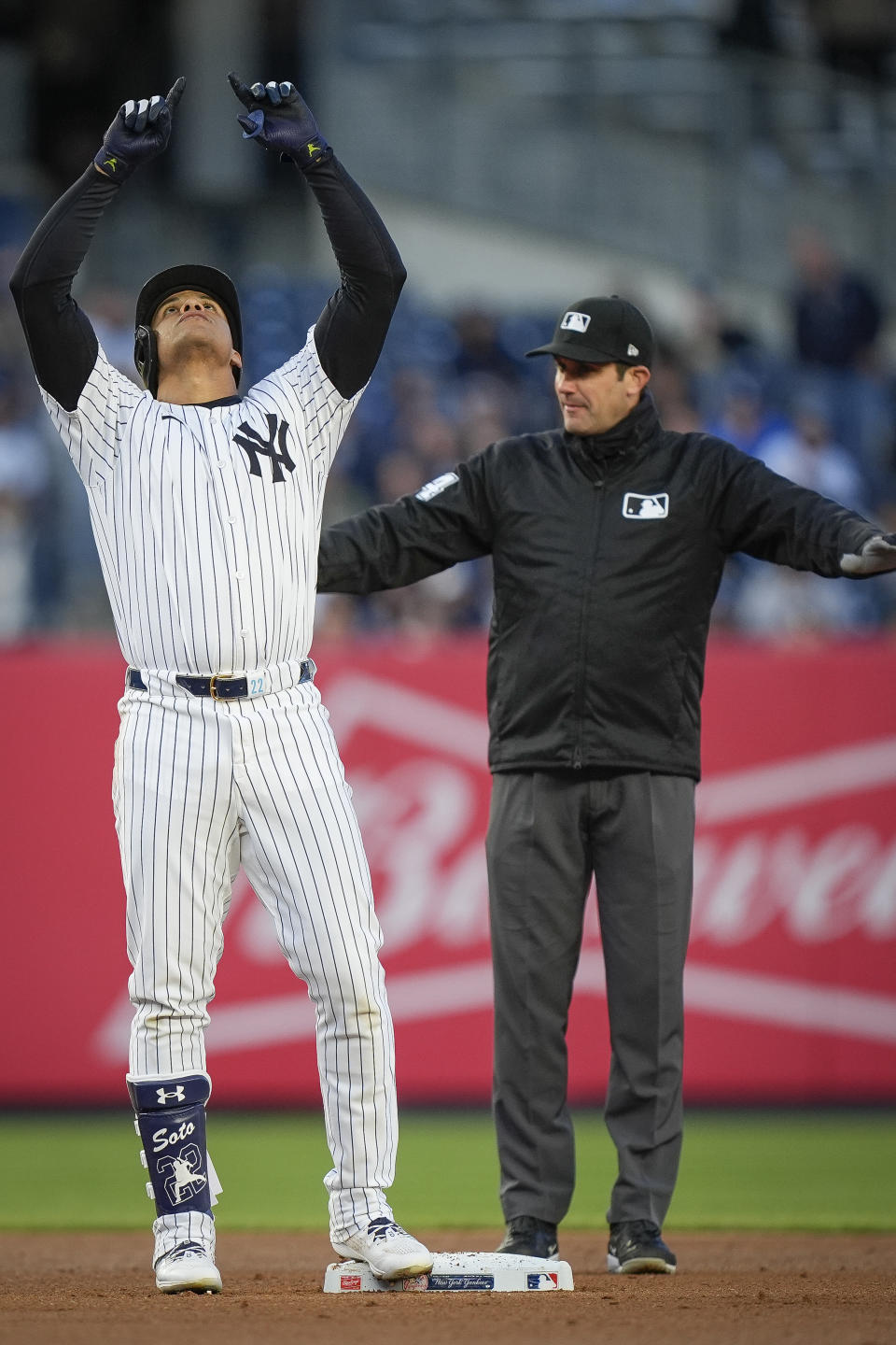 New York Yankees' Juan Soto celebrates after hitting a double against the Oakland Athletics during the first inning of a baseball game Thursday, April 25, 2024, in New York. (AP Photo/Bryan Woolston)