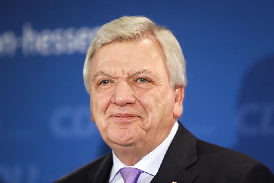 Hesse Prime Minister and Christian Democratic top candidate Volker Bouffier arrives at a party's election party after first results of the Hesse state election announced in Wiesbaden, Sunday, Oct. 28, 2018. (AP Photo/Michael Probst)