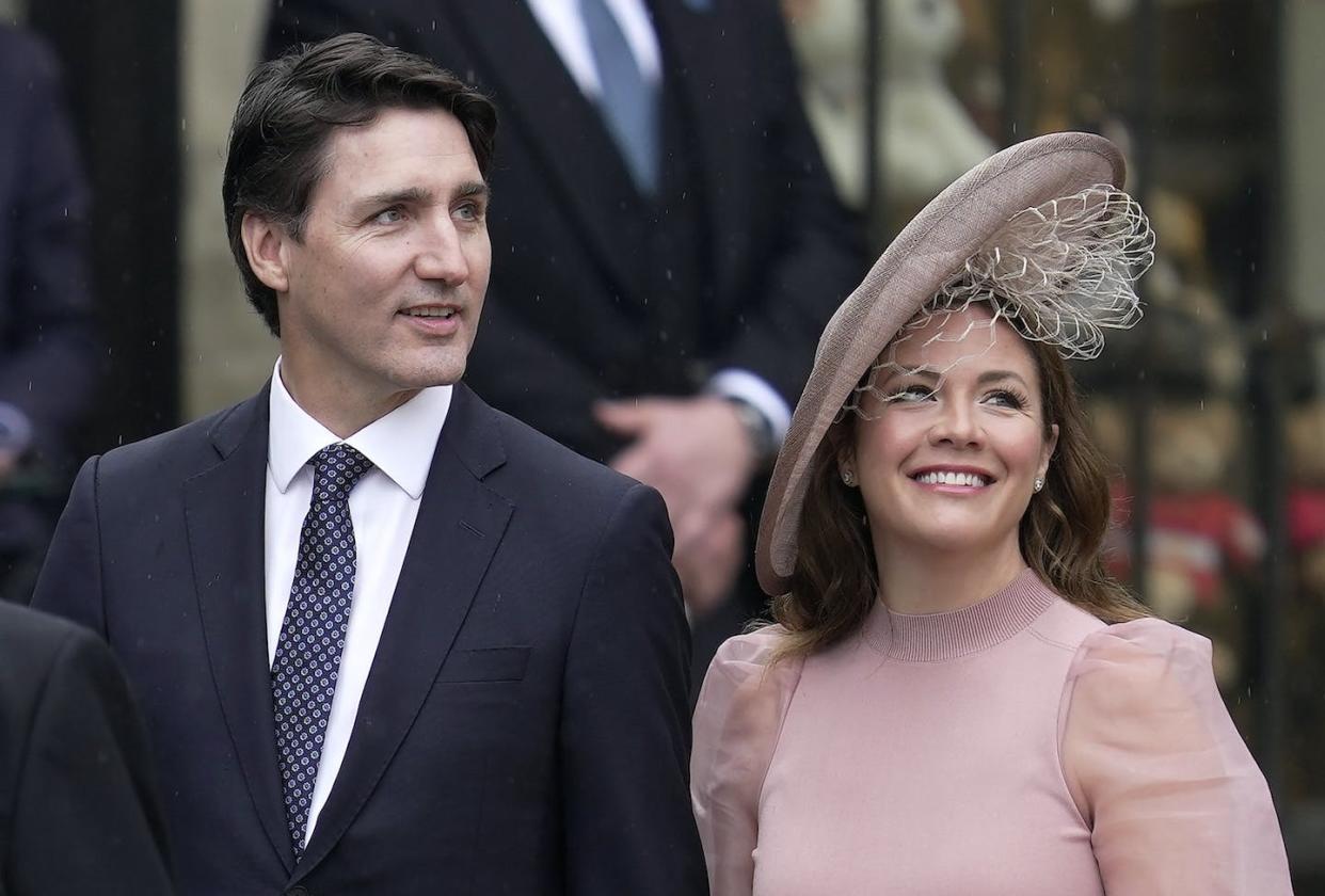 Prime Minister Justin Trudeau and Sophie Grégoire Trudeau arrive at Westminster Abbey prior to the coronation ceremony of King Charles in London in May 2023. (AP Photo/Kin Cheung)