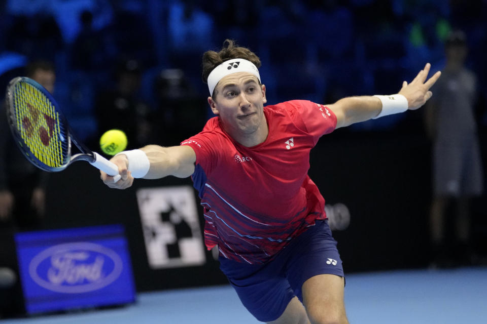 Norway's Casper Ruud hits a forehand to Serbia's Novak Djokovic during their singles final tennis match of the ATP World Tour Finals at the Pala Alpitour, in Turin, Italy, Sunday, Nov. 20, 2022. (AP Photo/Antonio Calanni)