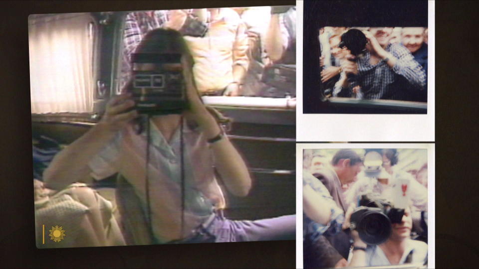 Samantha Smith taking Polaroid pictures of the international press taking her picture during her visit to the Soviet Union. &nbsp; / Credit: CBS News