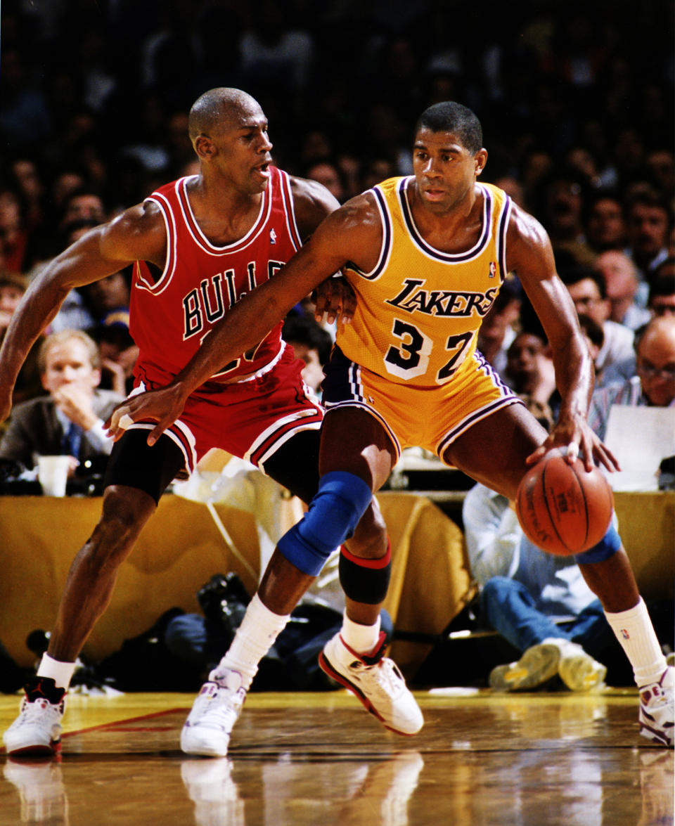 LOS ANGELES, CA Spring, 1991 –– Los Angeles Lakers Magic Johnson, right, is guarded by Michael Jordan of the Chicago Bulls in the 1991 NBA Finals in Los Angeles.  (Photo by Al Seib/Los Angeles Times via Getty Images)