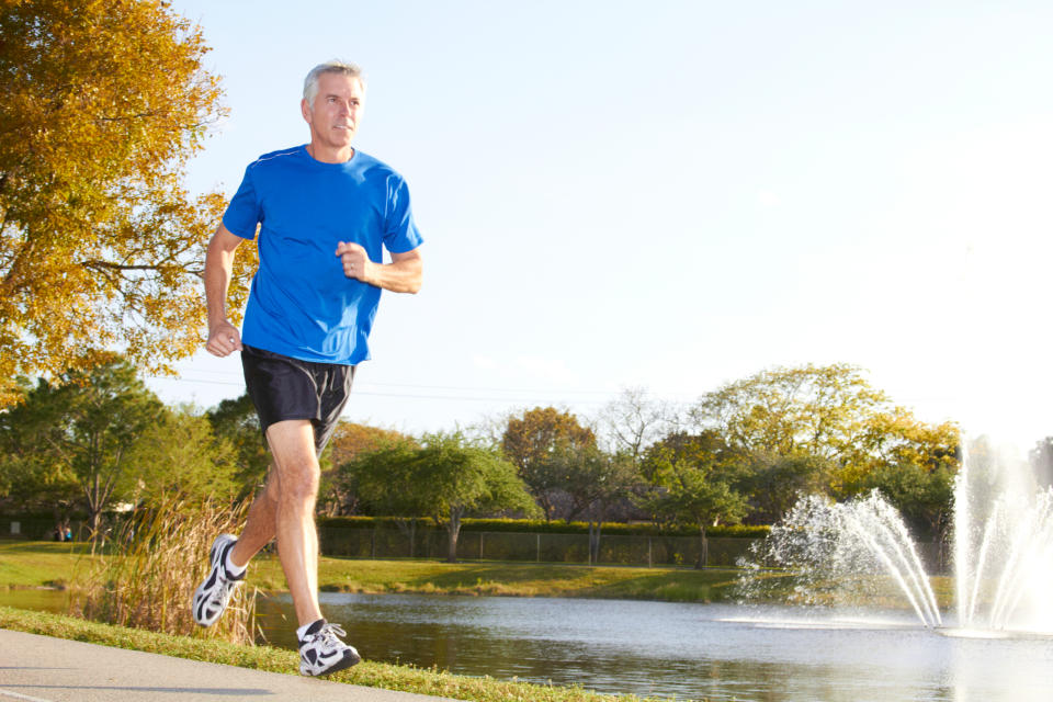 Older man jogging outdoors