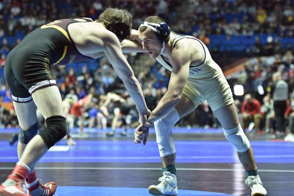 Clarion’s Seth Koleno looks for an opening on Bloomsburg’s Josh Mason in their 141-pound consolation preliminary match of the NCAA Championships on Thursday, March 16, 2023 at the BOK Center in Tulsa, Okla. Koleno, who is a Bald Eagle Area graduate, pinned Mason in 3:20.