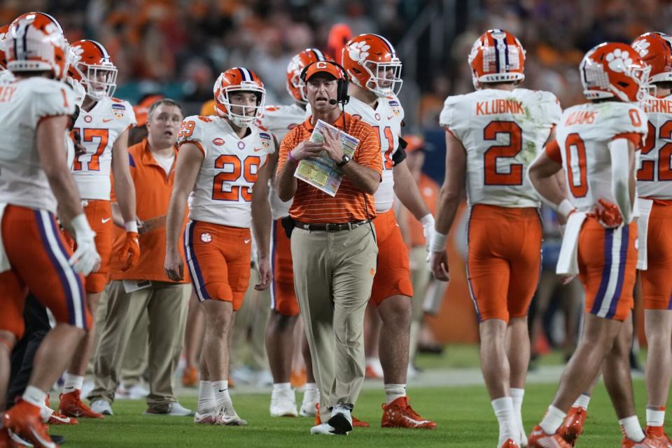 Clemson coach Dabo Swinney calls for a timeout against Tennessee in the Orange Bowl on Dec. 30.