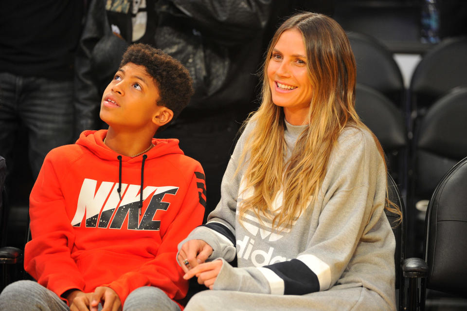 LOS ANGELES, CA - NOVEMBER 15:  Heidi Klum and son Henry attend a basketball game between the Los Angeles Lakers and the Philadelphia 76ers at Staples Center on November 15, 2017 in Los Angeles, California.  (Photo by Allen Berezovsky/Getty Images)