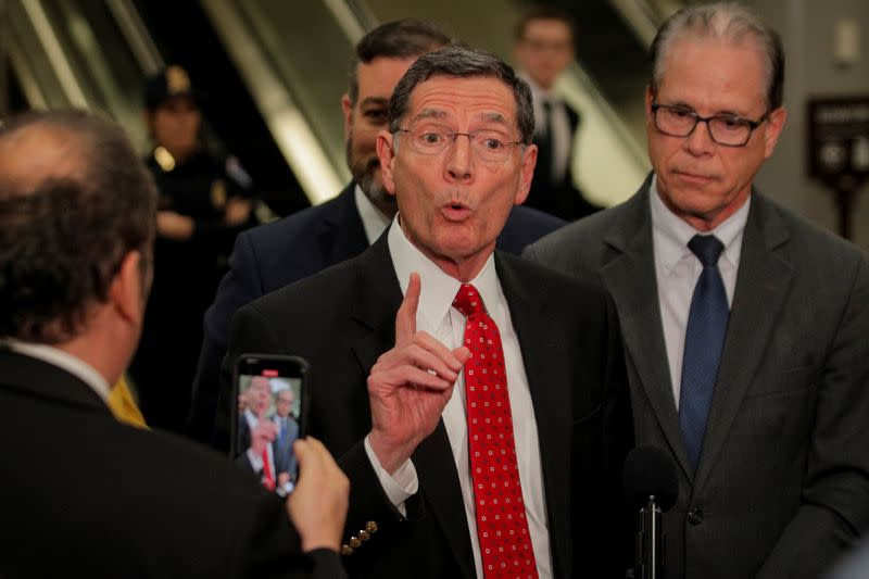 Senator John Barrasso speaks to reporters as the Trump impeachment trial continues in Washington