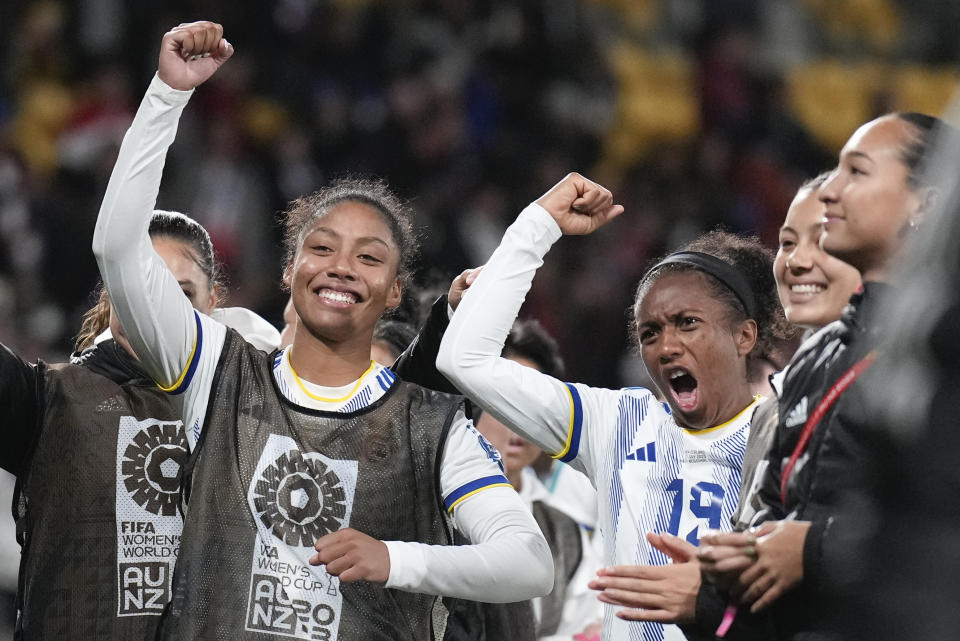 Philippines players celebrate following the Women's World Cup Group A soccer match between New Zealand and the Philippines in Wellington, New Zealand, Tuesday, July 25, 2023. (AP Photo/John Cowpland)