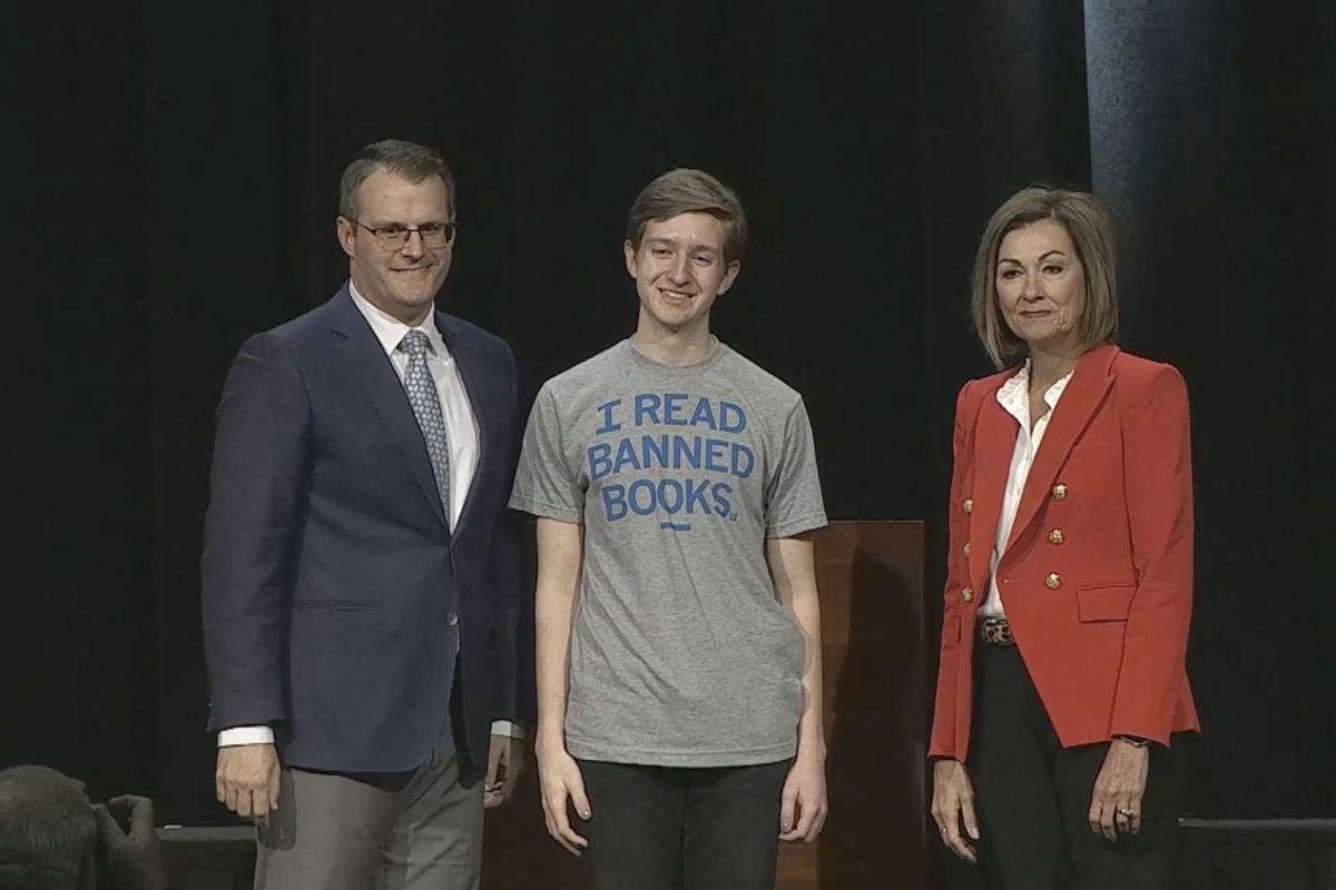 Students protest LGBTQ, education bills as Iowa Gov. Kim Reynolds hands