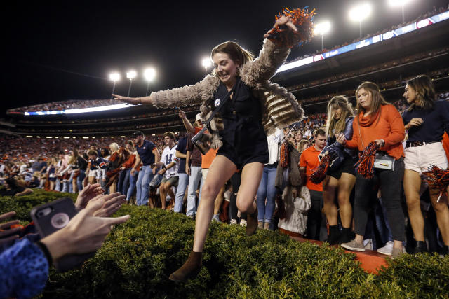 Women Get Stuck In Hedge At Auburn Alabama Football Game