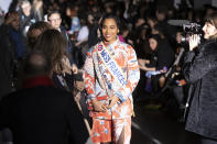 Clemence Botino, Miss France 2020, attends Leonard fashion collection during the Women's fashion week Fall/Winter 2020/21 presented in Paris, Thursday, Feb. 27, 2020. (AP Photo/Michel Euler)