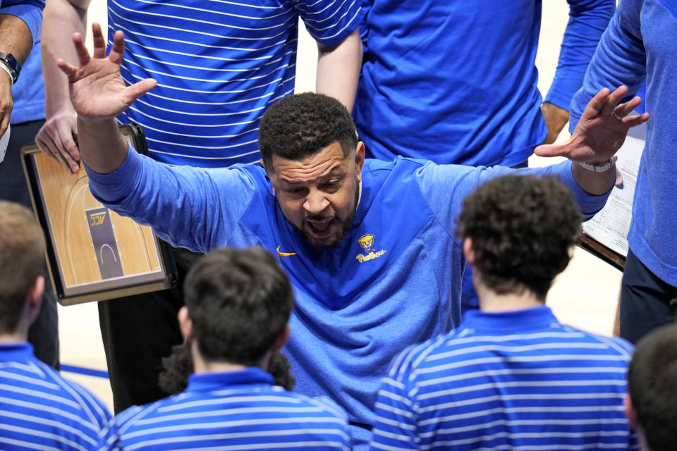 Pittsburgh head coach Jeff Capel gives instructions during a time out in the second half of an NCAA college basketball game against Florida State in Pittsburgh, Saturday, Jan. 21, 2023. Florida State won 71-64. (AP Photo/Gene J. Puskar)