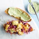 <p>Crunchy oven-fried cauliflower is a satisfying swap for the meat or fried seafood that typically packs this New Orleans favorite. Creamy avocado mayo and crisp cabbage slaw provide additional layers of flavor and texture.</p>
