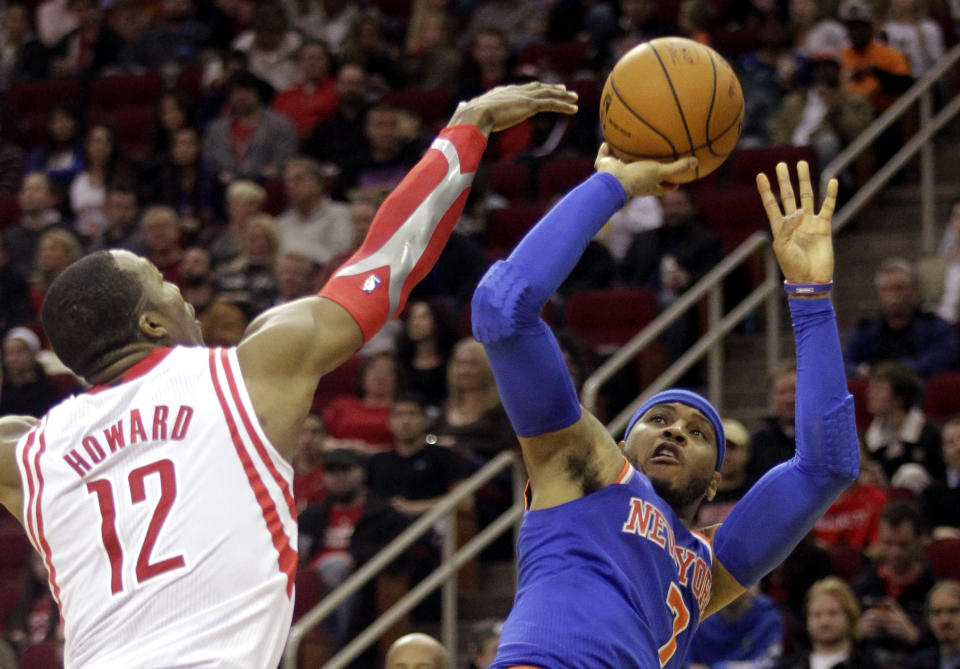 Carmelo Anthony shoots over Dwight Howard, four and a half years and a couple of lifetimes ago. (AP)