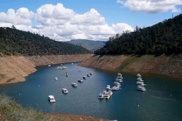 PHOTO: Houseboats sit in the drought lowered waters of Oroville Lake, near Oroville, Calif., April 19, 2022. (Rich Pedroncelli/AP, FILE)