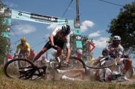 Team Sky rider Chris Froome of Britain crashes during stage 9. REUTERS/Benoit Tessier