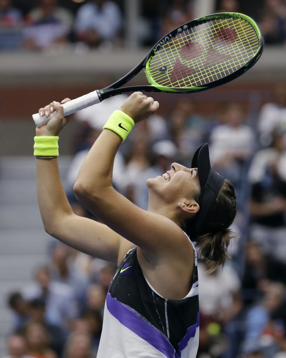 Belinda Bencic, of Switzerland, reacts after defeating Naomi Osaka, of Japan, 7-5, 6-4 during the fourth round of the US Open tennis championships Monday, Sept. 2, 2019, in New York. (AP Photo/Frank Franklin II)