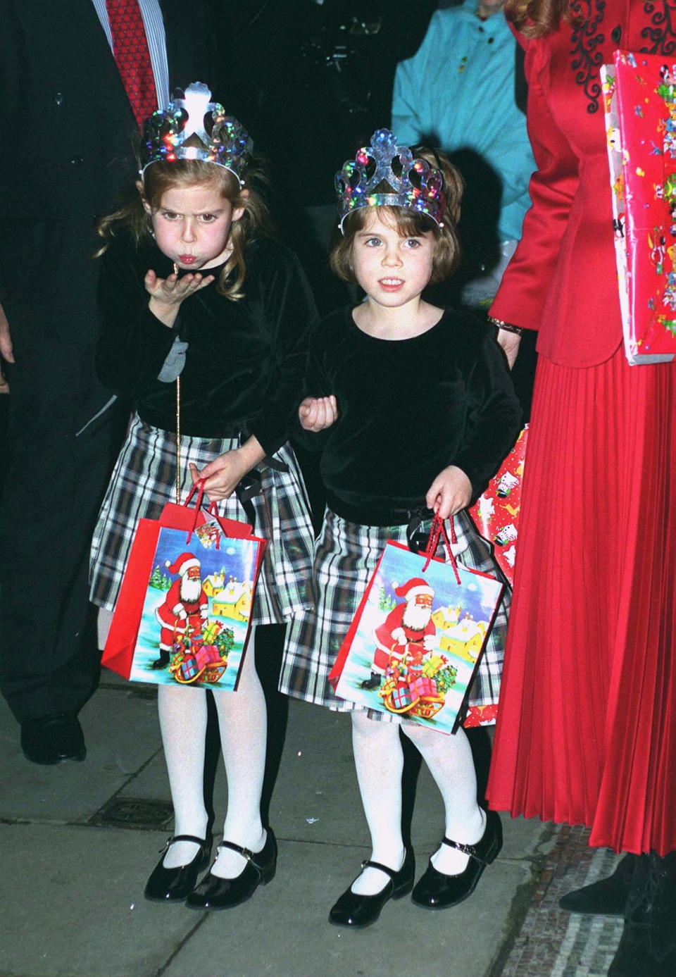 LONDON, UNITED KINGDOM - DECEMBER 18:  Duchess Of York With Her Daughters Princess Beatrice And Princess Eugenie Attending Christmas Pantomime 'cinderella' In Aid Of 'children In Crisis' Of Which The Duchess Is Patron.  (Photo by Tim Graham Photo Library via Getty Images)