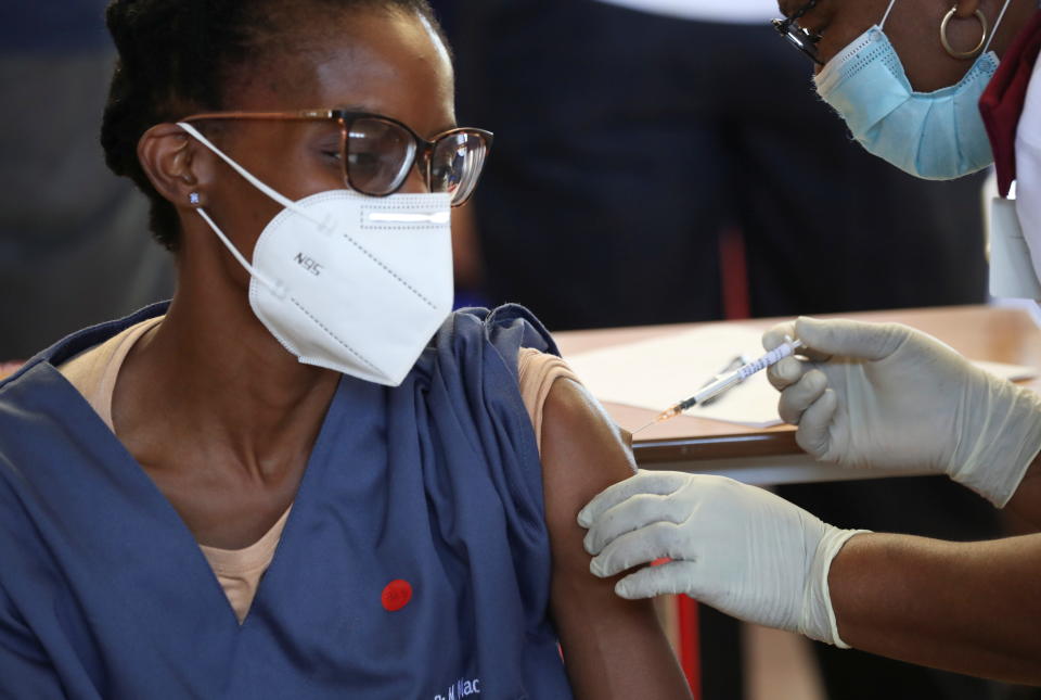 A healthcare worker receives the Johnson and Johnson coronavirus disease (COVID-19) vaccination at the Chris Hani Baragwanath Academic Hospital in Soweto, South Africa, February 17, 2021. REUTERS/Siphiwe Sibeko