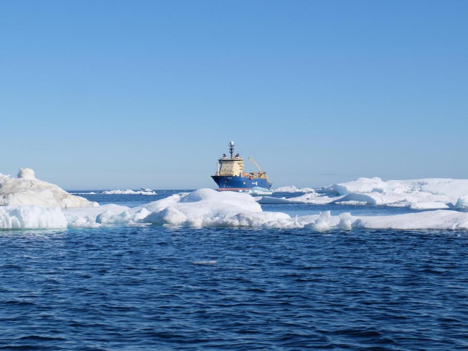 A subsea laying vessel in the Greenland sea.