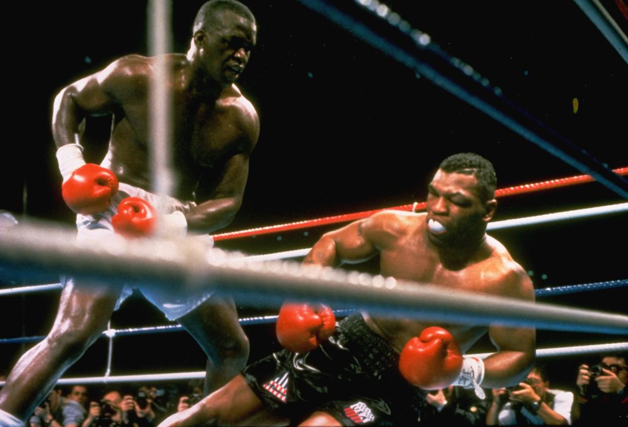 JAPAN - FEBRUARY 11:  Boxing: WBC/WBA/IBF Heavyweight Title, James Buster Douglas in action, knocking out Mike Tyson at Tokyo Dome, Tokyo, JPN 2/11/1990  (Photo by Tony Triolo/Sports Illustrated via Getty Images)  (SetNumber: D30738)