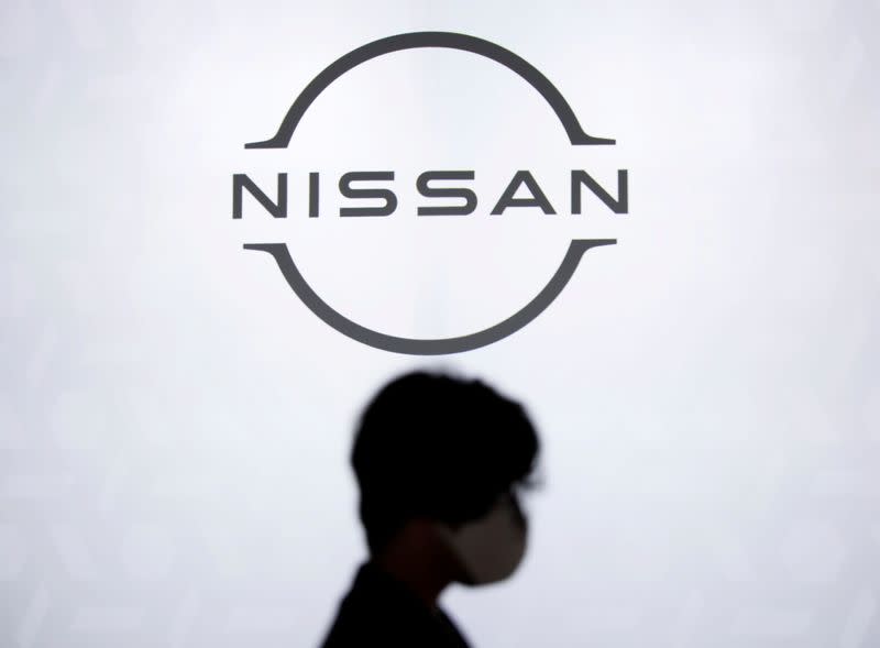 FILE PHOTO: The brand logo of Nissan Motor Corp. is displayed during a press preview of the company's new Ariya all-battery SUV in Yokohama