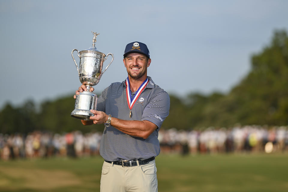 PINEHURST, NORTH CAROLINA - JUNE 16:  Bryson DeChambeau smiles with the trophy following his victory in the final round of the U.S. Open on the No. 2 Course at Pinehurst Resort on June 16, 2024, in Pinehurst, North Carolina. (Photo by Keyur Khamar/PGA TOUR via Getty Images)