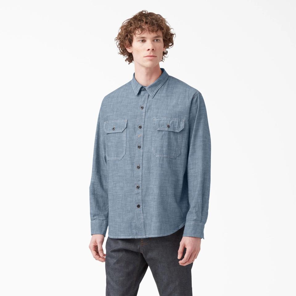 Model wearing a Dickies chambray work shirt