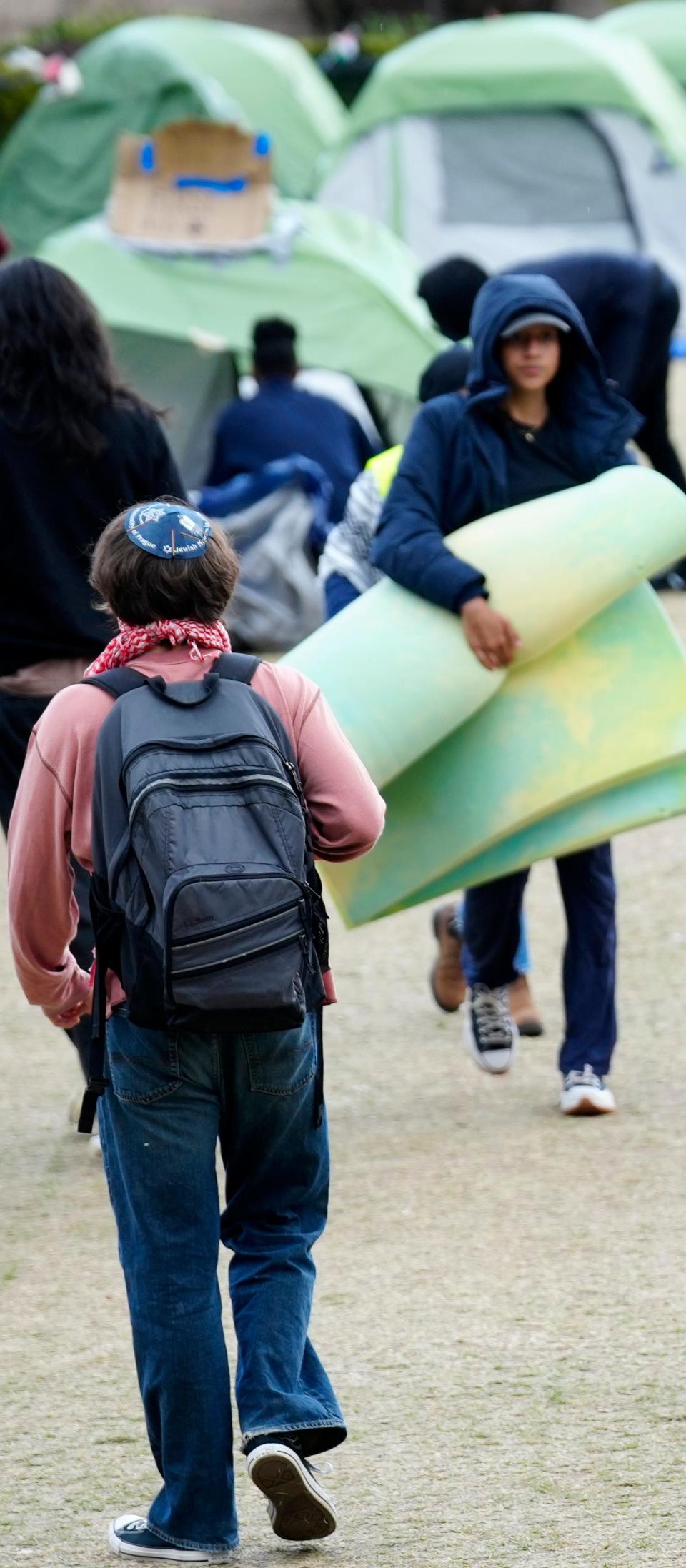 A person is shown wearing a yarmulka inside the pro-Palestinian encampment, on the campus of Columbia University, Wednesday, April 24, 2024, in New York City.