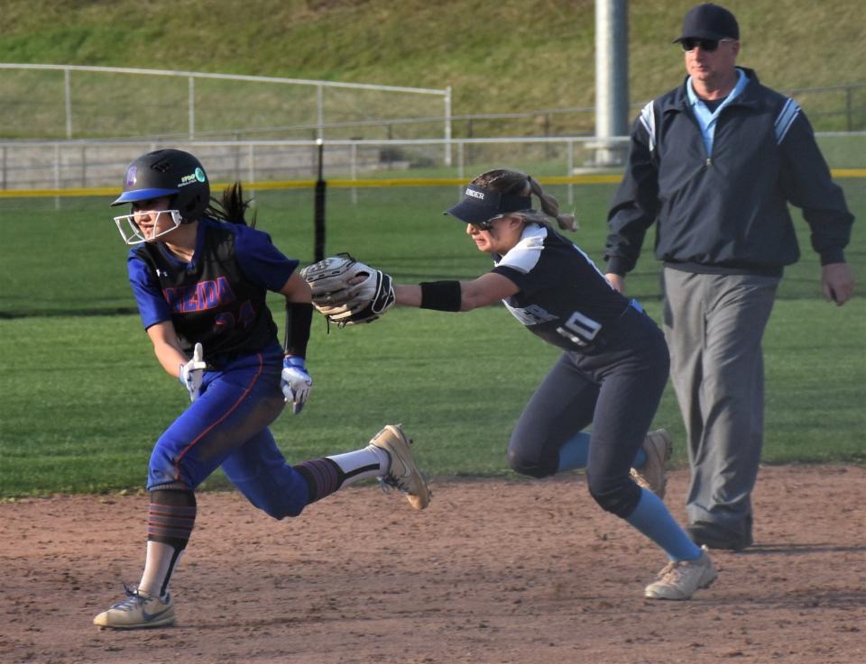 Central Valley Academy center fielder Bella Kleban pursues Oneida Indian Vanessa Babcock (left) in a rundown during the sixth inning of Thursday's game at Lower Tolpa.