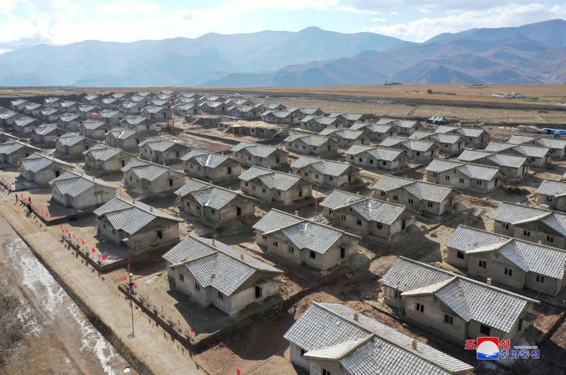 North Korean leader Kim Jong Un inspects a damage recovery site affected by heavy rains and winds caused by recent typhoons, in Geomdeok district, South Hamgyong