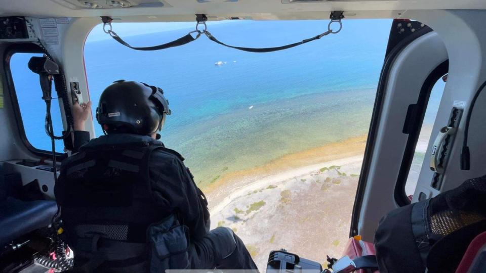 A man has been airlifted from a remote island on the Great Barrier Reef after a suspected shark attack. Picture: Supplied / Queensland Ambulance Service,