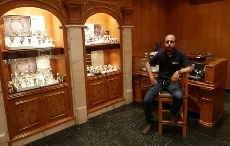 Watch seller Sameh al-Abani, 38, poses for a photograph at a store in Benghazi, Libya, May 14, 2017. REUTERS/Esam Omran Al-Fetori