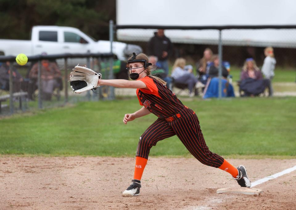 Summerfield Mia Miller reaches for a throw at third base during a loss to Ida Monday.