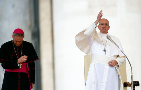 Pope Francis blesses at the end of special audience for Catholic Action members in St. Peter's Square at the Vatican, April 30, 2017. REUTERS/Tony Gentile